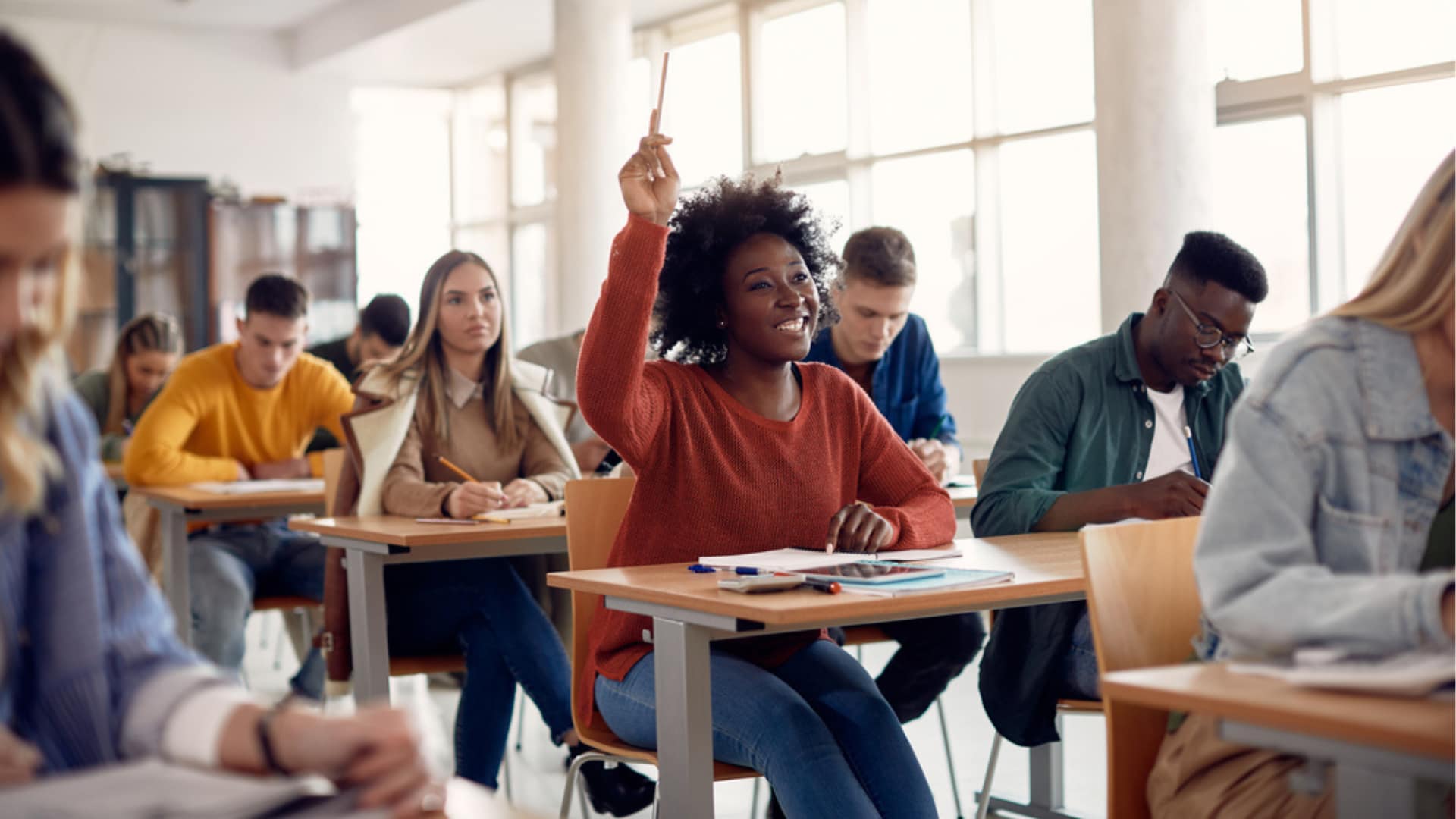 A school alert system with wearable panic button technology enhances college campus safey.