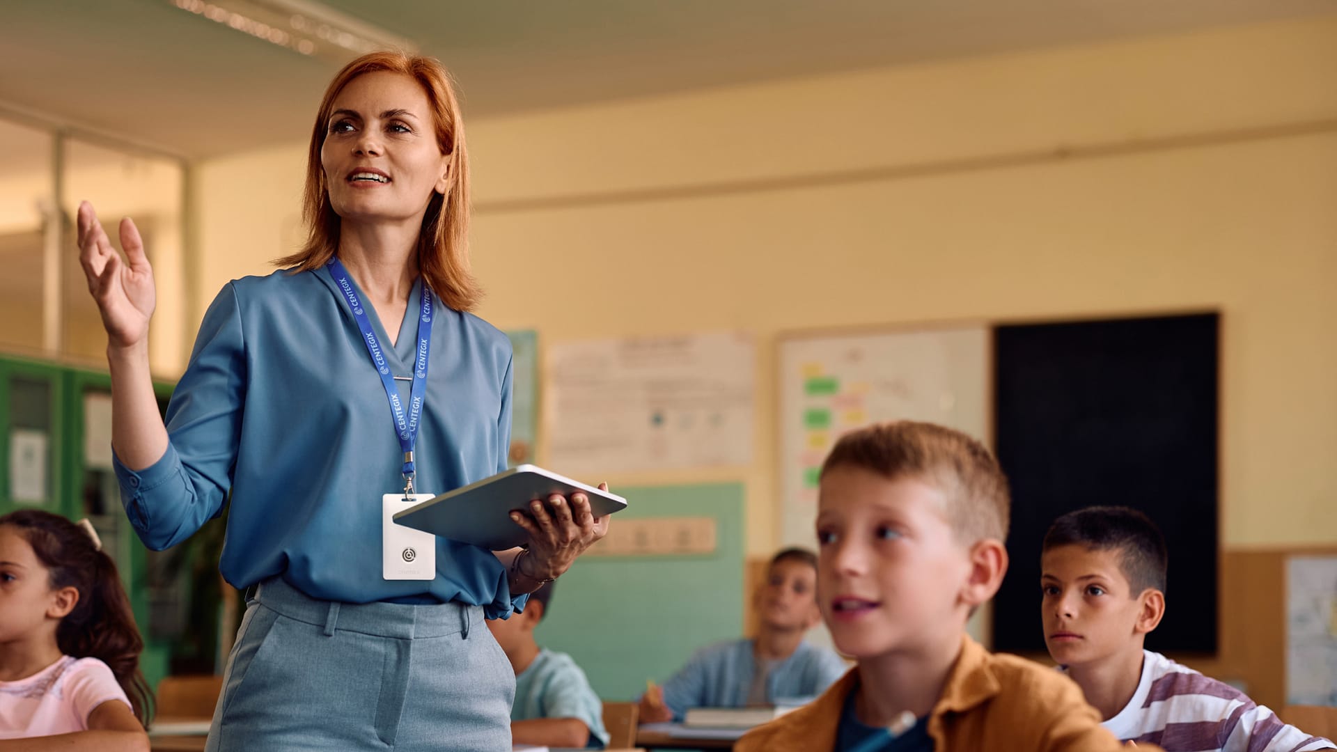 School teacher instructing students